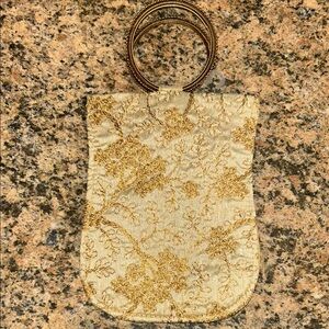 Elegant Gold and Cream Clutch with Textured Finish